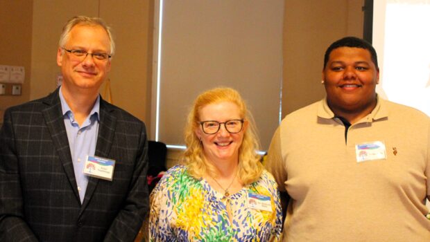 Image of roots of prevention award winners Peter VonDoepp, Dr. Kimberly Blake, and Sidiki Sylla